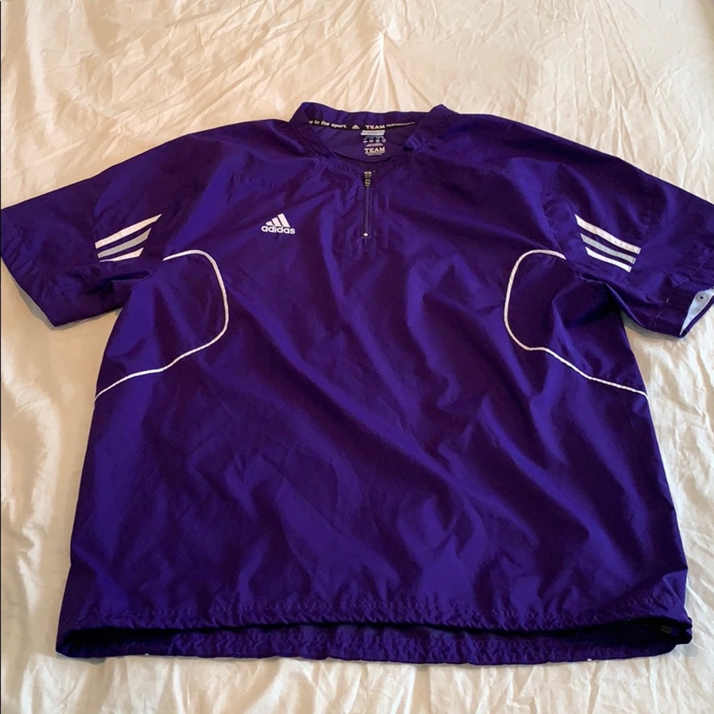 Adidas “sample” track shirt.